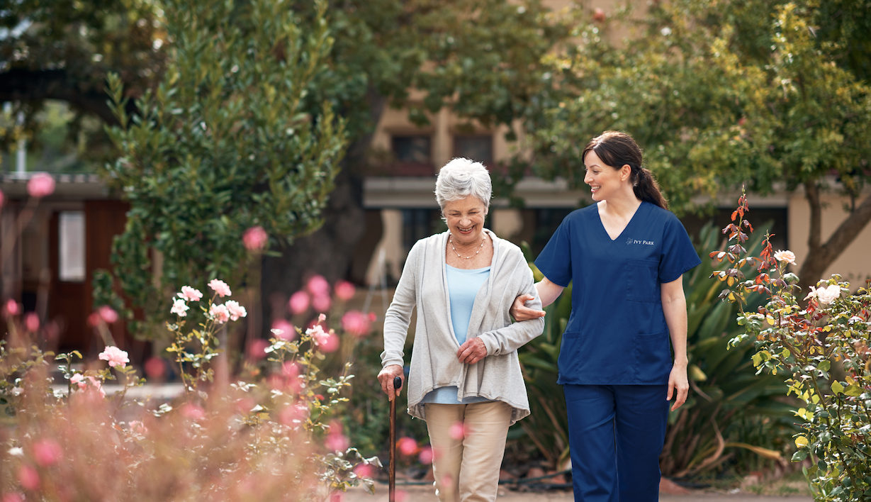 Skilled nursing staff assisting a resident with physical therapy